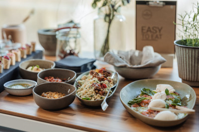 buffet table with a variety of catering dishes