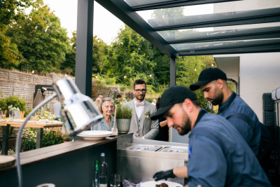 Chefs at work preparing plates live at a wedding in Rodgau